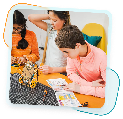 Teacher exploring BirdBrain resources with students