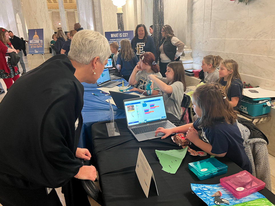 Legislator learning to code at the capitol