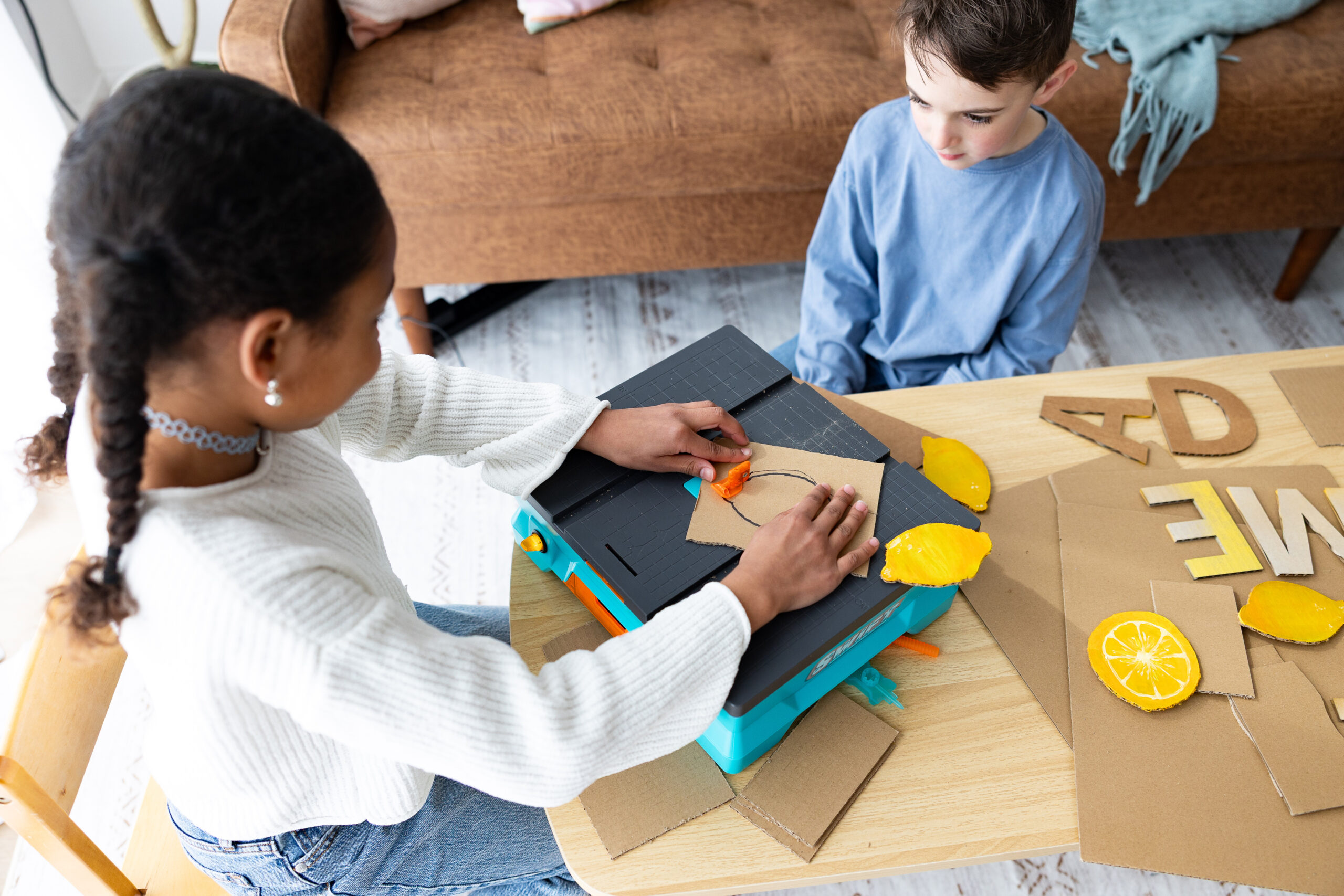 Students working on a cardboard project