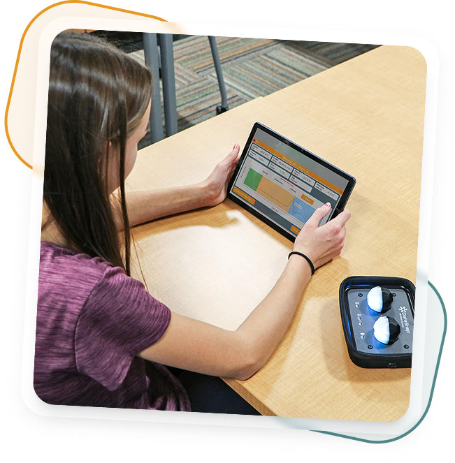 Student analyzing DataSnap experiment data on a tablet