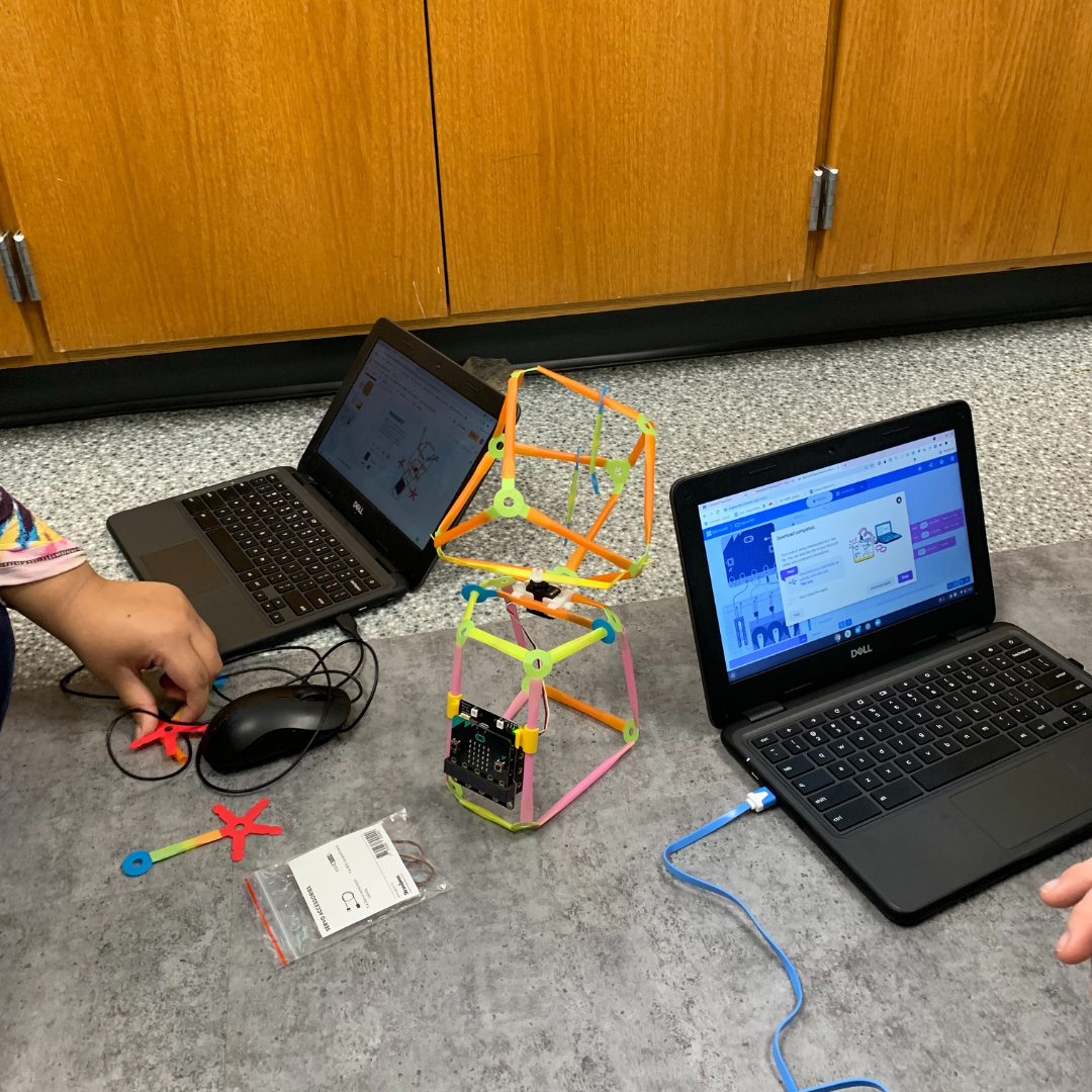 Students using Strawbees with laptops
